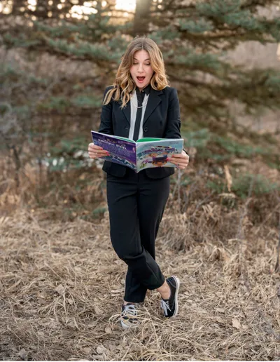 Jordan Hayes reading a Woven Reading book